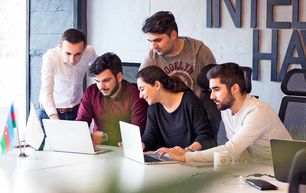 Precise Ghostwriting editors and writers at work
